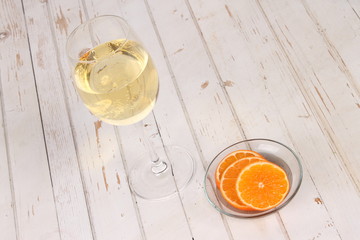 champagne wine glass and slice orange