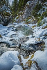 Frozen river on mountains