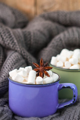 Two cups of cocoa with marshmallows