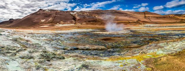 Panorama of sulfur and steam Namafjall landscape in Iceland