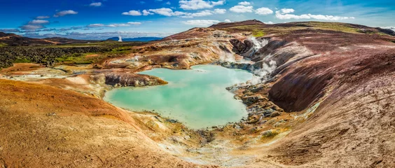 Tuinposter Panorama of blue pond on volcano area in Iceland © shaiith