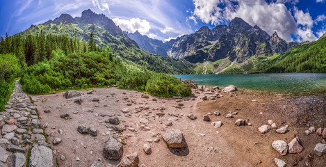 Panorama of beautiful lake in the mountains at summer © shaiith