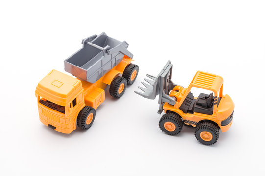 Two orange toy construction