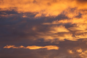 Naklejka na ściany i meble Sharp clouds on the sunrise