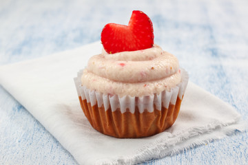 Strawberry Cupcakes with strawberry frosting and fresh Strawberry Hearts