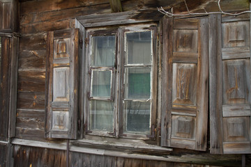 Window of an ancient wooden house, Poland