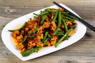 Crispy chicken and green bean dish ready to eat