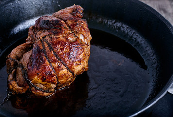 Beef stew tied with thread in pan