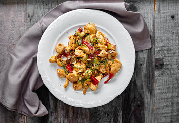 Kung Pao Chicken on wood Background