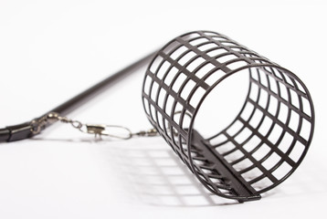 Feeders for fishing on a white background.