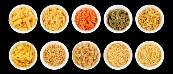 Set of different types of pasta on the black background