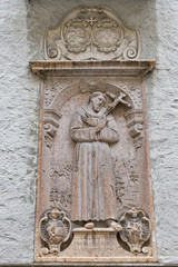 Wall statue of Franciscan Church in Salzburg, Austria