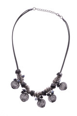 black necklace with beads on white background