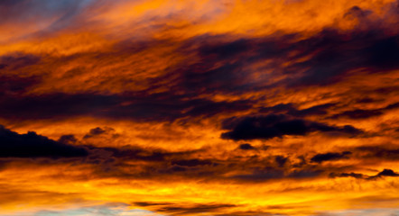 Naklejka na ściany i meble vibrant colored clouds at sunset