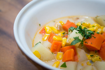 corn soup close up in a bowl 