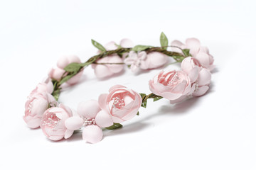 wreath of pink flowers on a white background