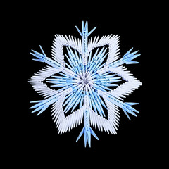 Origami snowflake on black