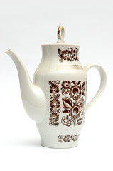 teapot with a pattern on a white background