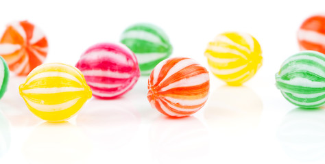 Fototapeta na wymiar colored candies isolated on white.