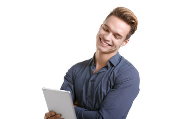 Young man Looking at a tablet, isolated in white