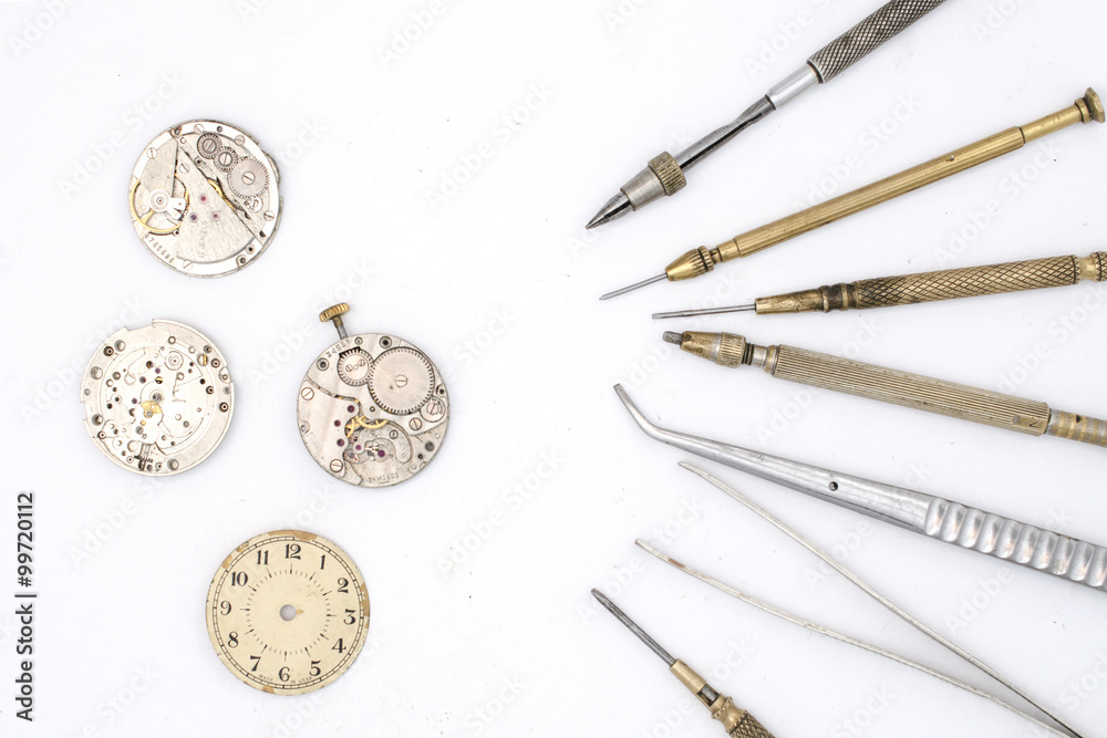 Wall mural watchmaker tools isolated on white