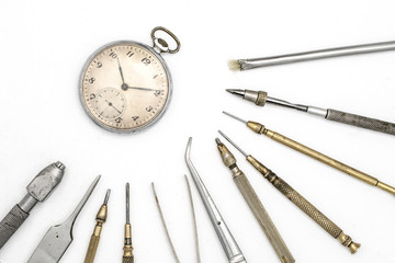 watchmaker tools isolated on white