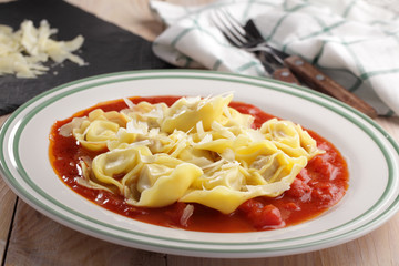 Ravioli with tomato and Parmesan