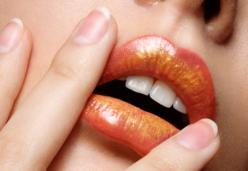Close-up of beautiful  make-up lips and  natural manicure