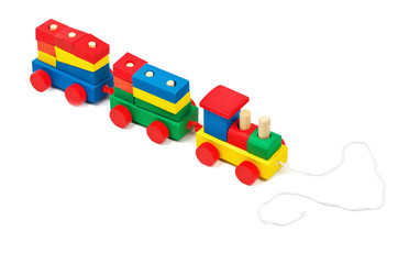 Wooden colorful toy train with rope isolated on white background