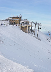 Fototapeta na wymiar Chair lifts in Kasprowy Wierch mountain of Zakopane in winter