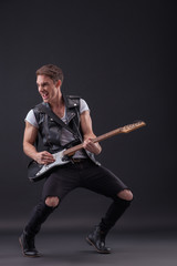 Fototapeta premium Skillful young musician is making great performance