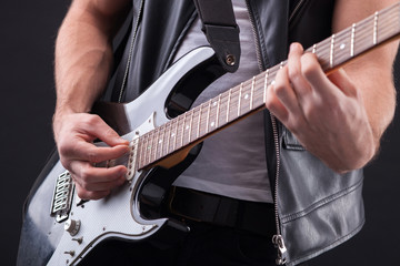 Fototapeta premium Skillful young musician in making great performance