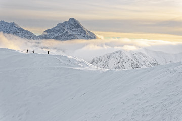 Fototapeta na wymiar People at the top of Kasprowy Wierch in Zakopane in Tatras in winter