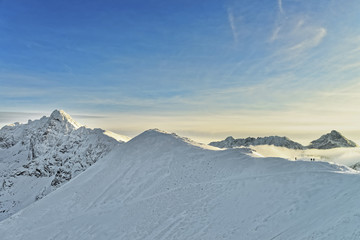 Sun and fog in Kasprowy Wierch of Zakopane in Tatra Mounts in wi