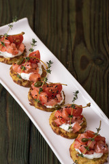 Potato pancakes with salted salmon and creme fraiche
