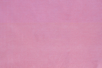 pink linen surface - close up of textile background - pastel ton
