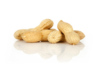 peanuts on a white background with shell