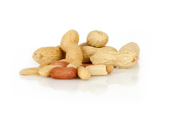 peanuts on a white background with shell