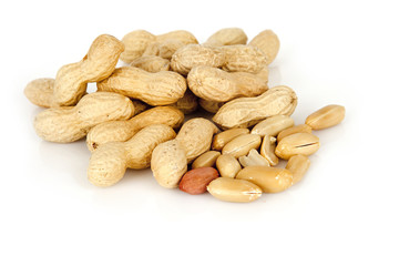 peanuts on a white background with shell
