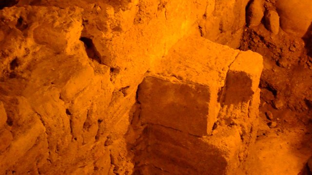 Excavation of ancient settlements about the temple.