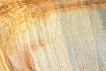 Patterned sandstone texture background.