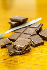 Dark Chocolate on Wooden Table