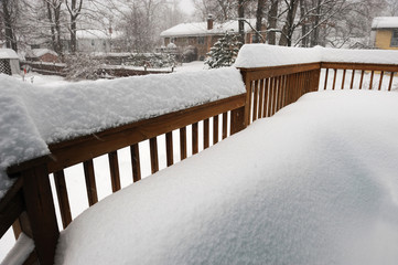 snow accumulated on the deck after heavy snow storm