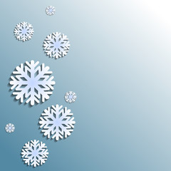 paper snowflakes on blue and white background