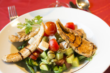 Grilled chicken breast with Greek salad