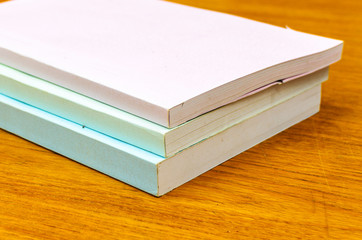 books on a wood background