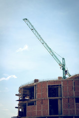 building construction site with large construction crane