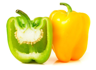 colored peppers over white background