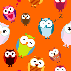 Seamless texture with cartoons owls. Background.