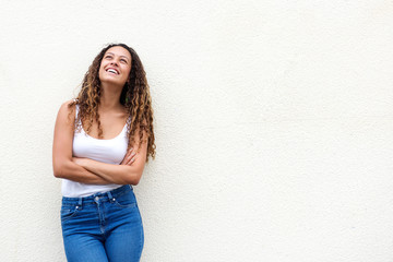 Relaxed young woman looking up smiling